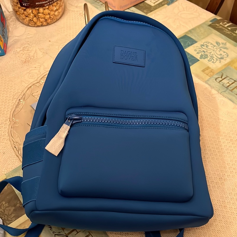 It is a royal blue Dagne Dover bag.
